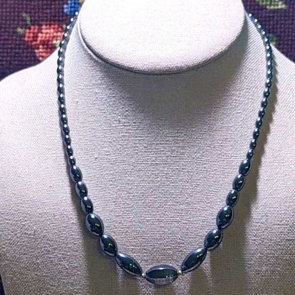 Vintage Graduated Hematite and Gold Toned Bead Necklace with Barrel Clasp.